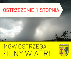 Czarny napis "IMGW OSTRZEGA SILNY WIATR!" i Herb Gminy Lesznowola na żółtym tle. Czerwony napis "OSTRZEŻENIE 1 STOPNIA" na białym tle.