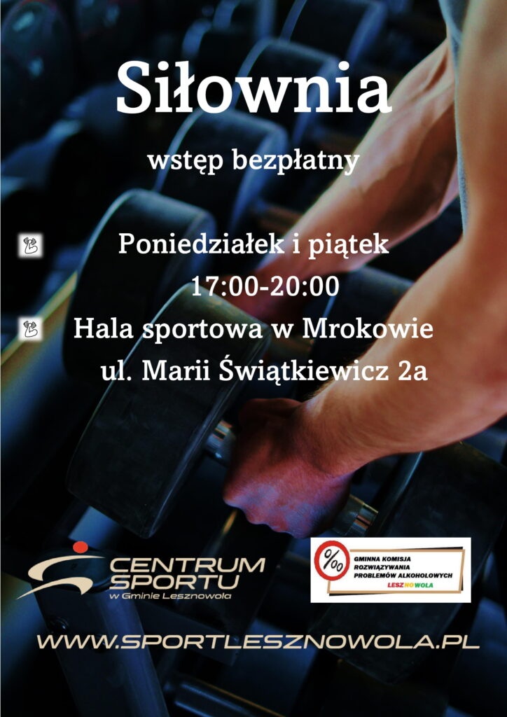 Ręce mężczyzny łapią za hantle w siłowni.