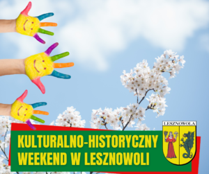 N atle błekitnego nieba kwitnące drzewo i kolorowo pomalowane dziecięce dłonie