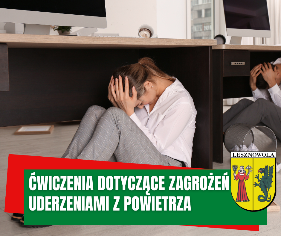 zdjęcie przedstawia osoby szukające schronienia pod biurkiem